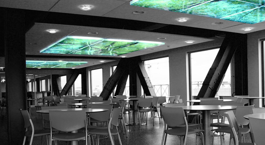 The huge cantine hall in the building is divided into several areas with different looks to them. This costum designed lightbox is part of the "green" area for quick eating
